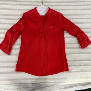 Women’s red blouse.